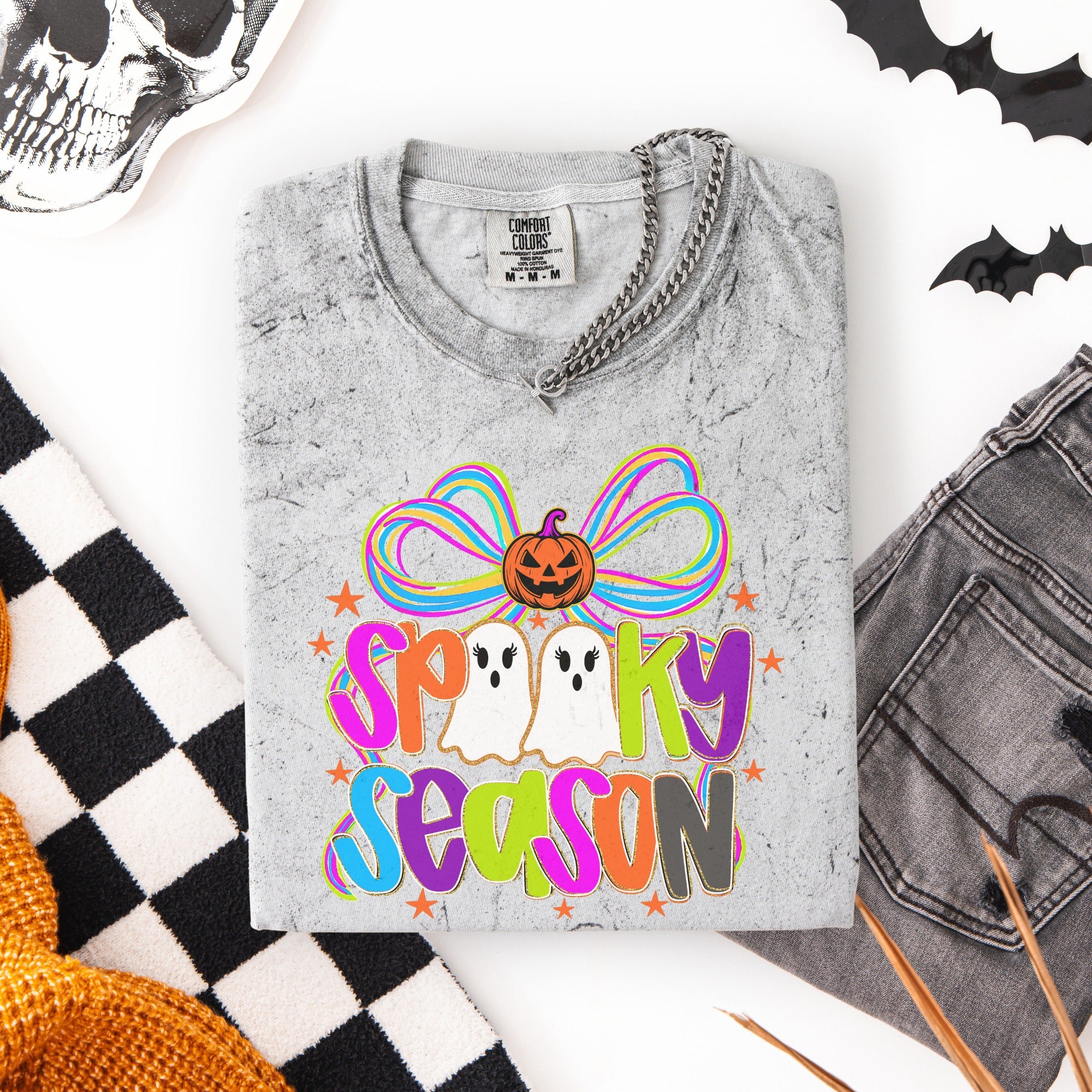 Cutesy Spooky Season with pumpkin on bow